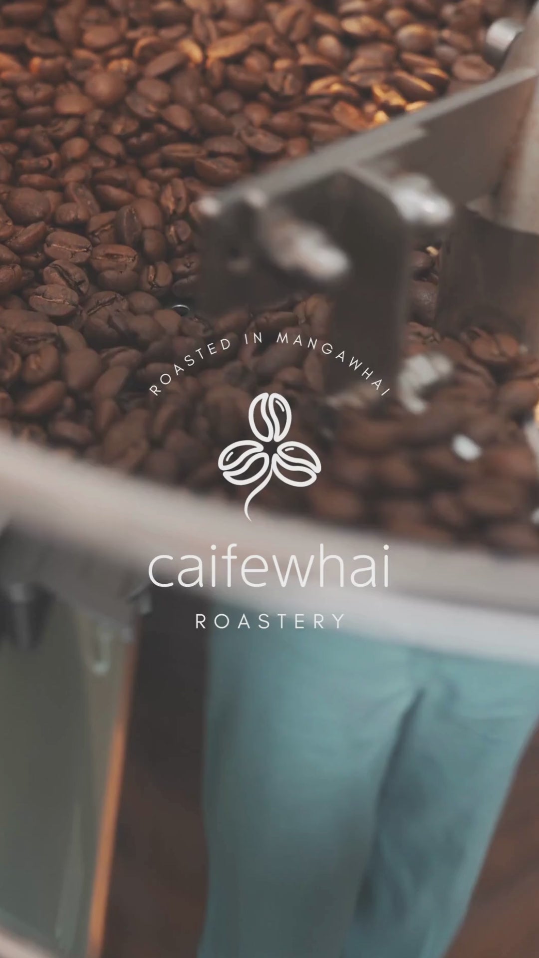 Load video: coffee beans being roasted followed by a barista making coffees.